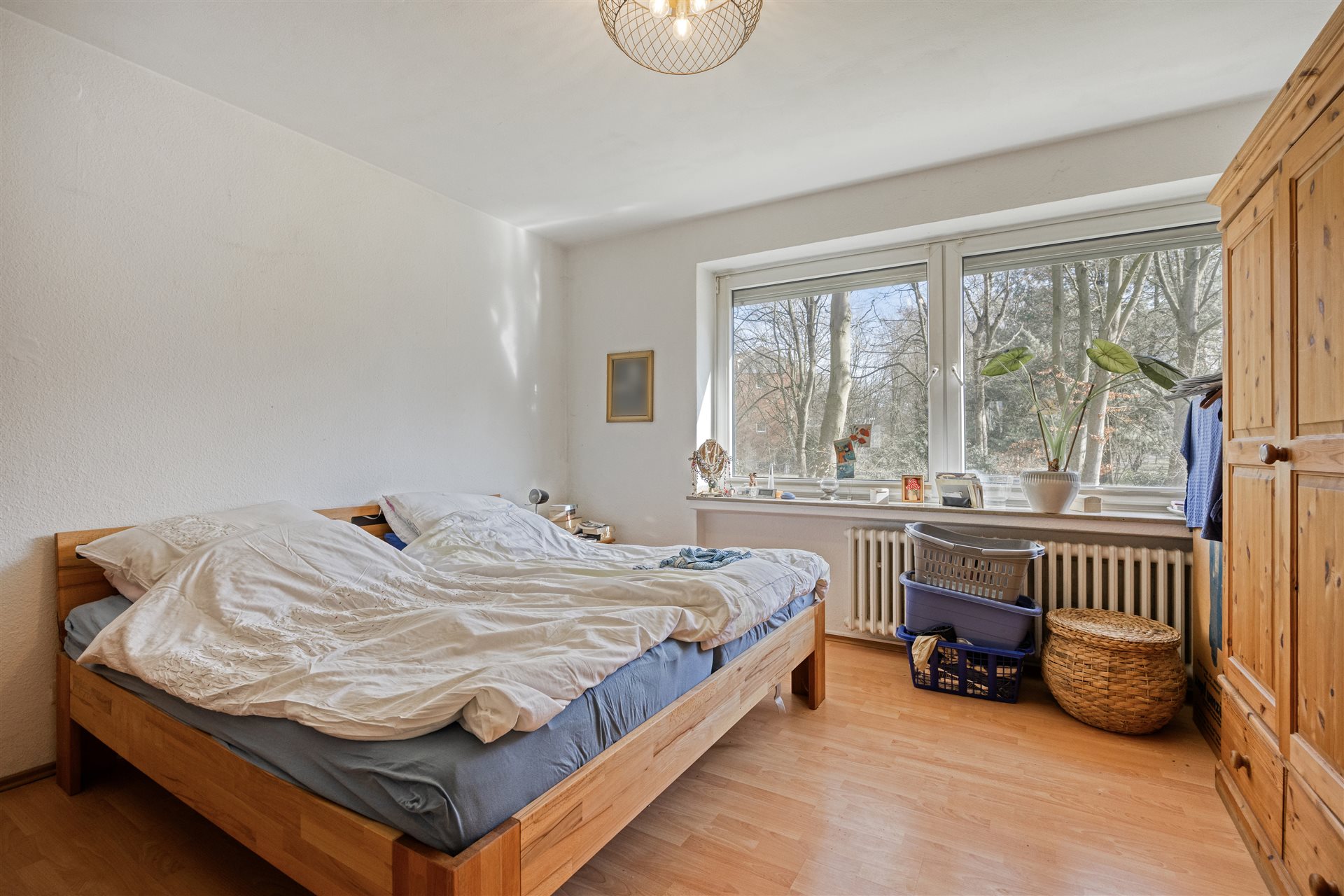 Eigentumswohnung Münster-Aaseestadt – Schlafzimmer mit Grünblick