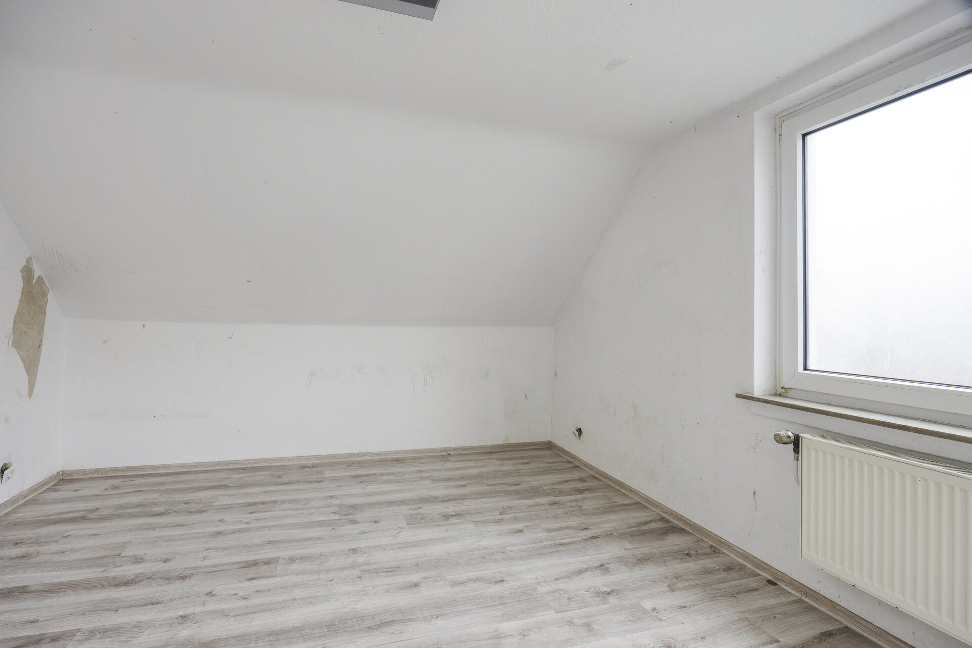Dachgeschosswohnung Bad Oeynhausen – Schlafzimmer 1