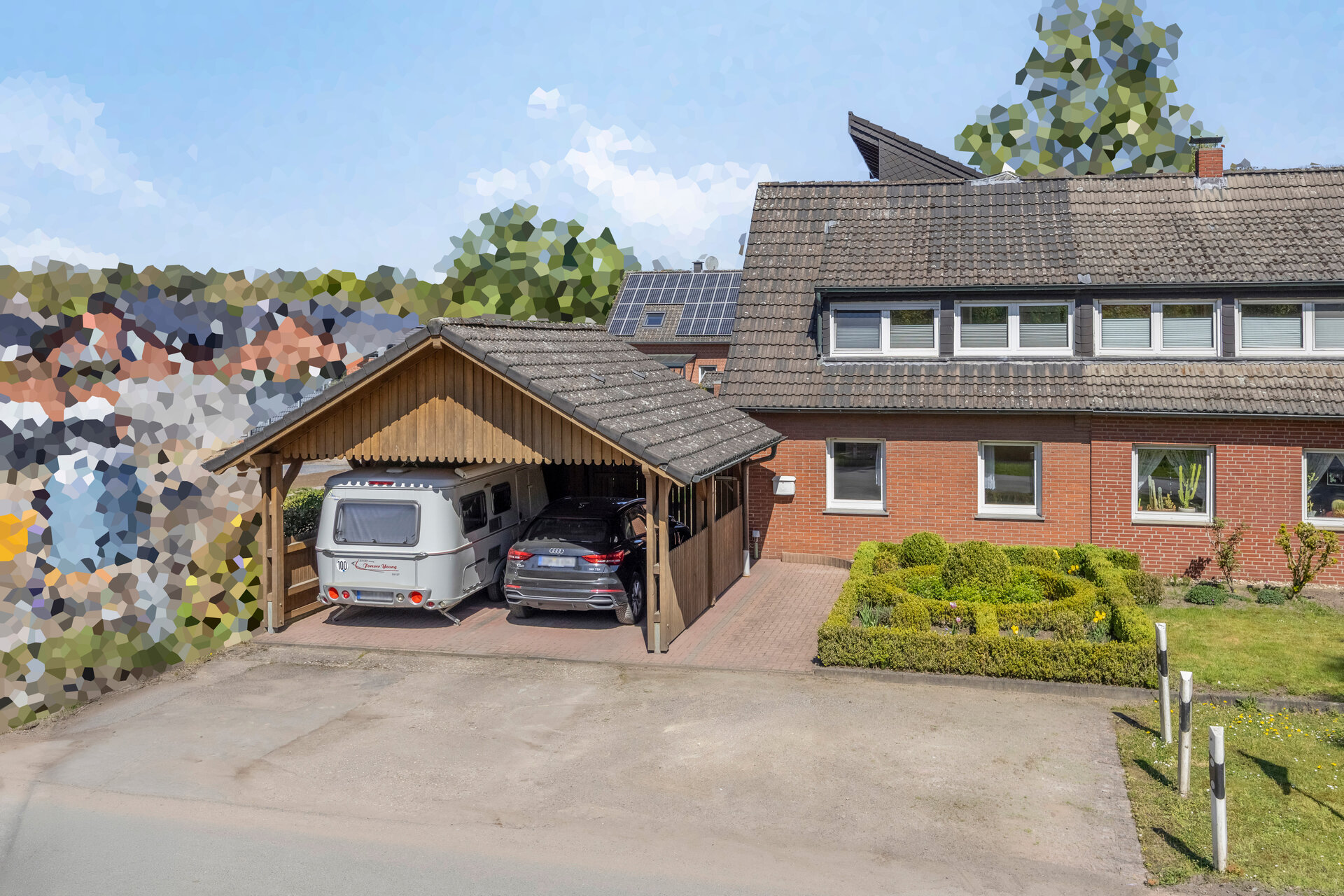 Zweifamilienhaus Bocholt – Außenansicht mit Carport