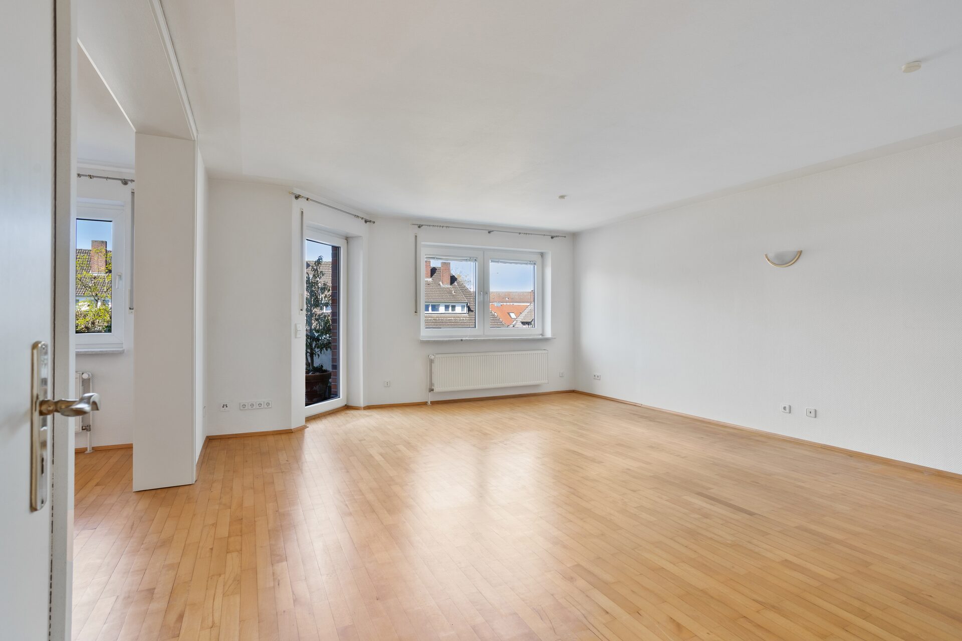 Eigentumswohnung Münster – Großzügiges Wohnzimmer mit Balkonzugang