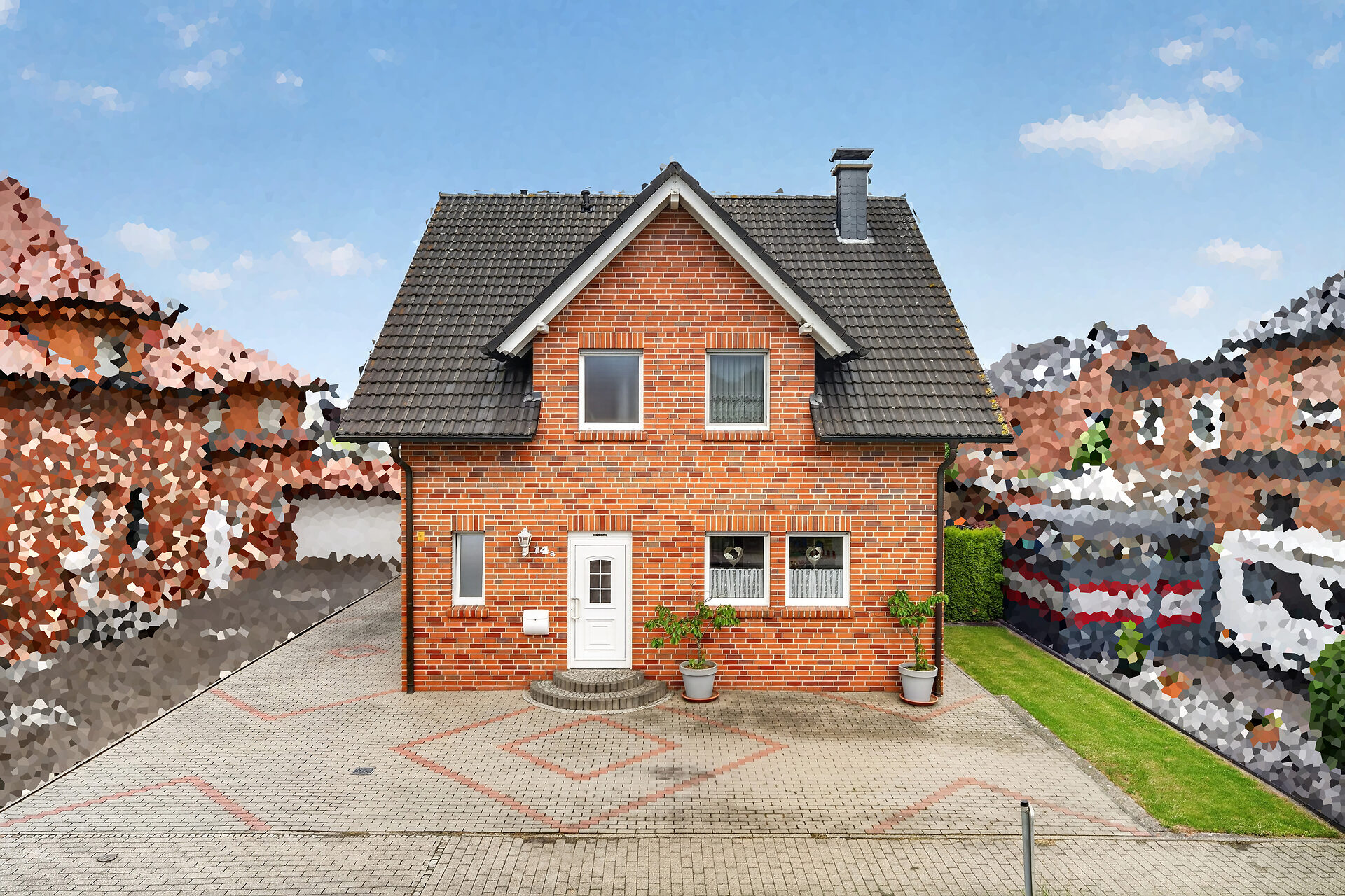 Einfamilienhaus Ascheberg Herbern – gepflegte Hausansicht mit Klinkerfassade und Garage