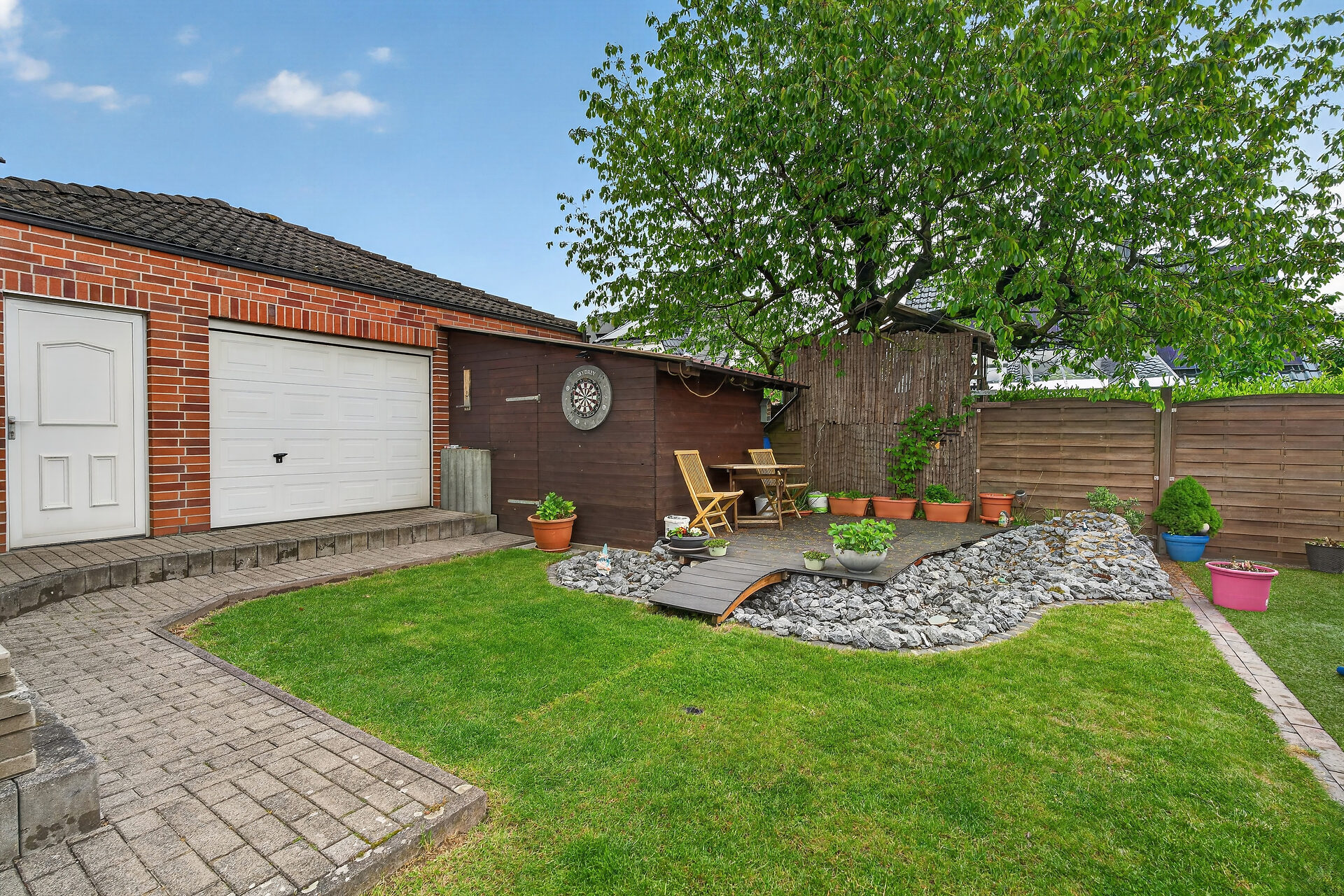 Einfamilienhaus Ascheberg Herbern – gepflegter Garten mit Rasenfläche und Garage