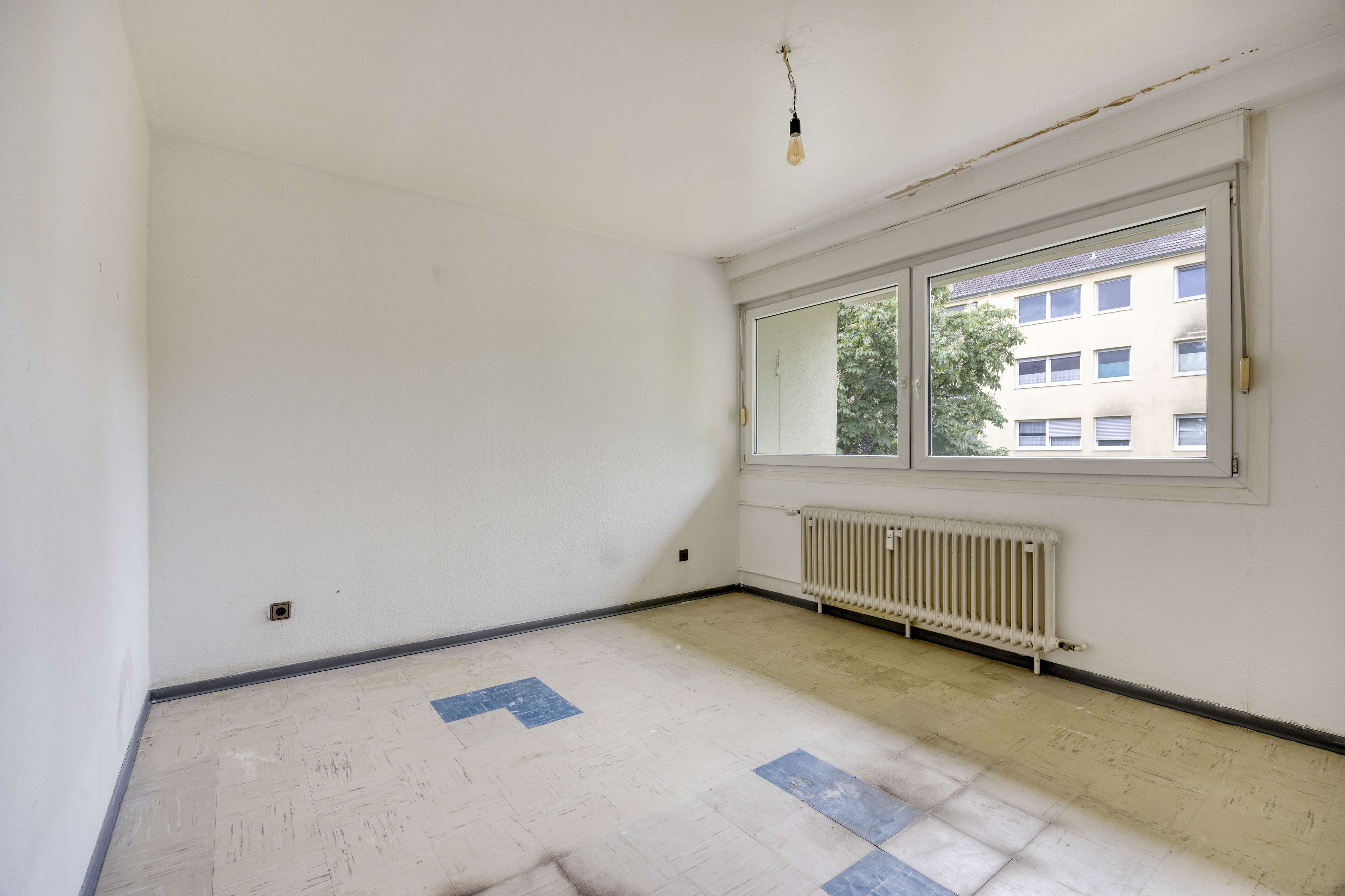 Eigentumswohnung Münster-Coerde – Hausansicht Wohnanlage Nerzweg aus erhöhter Perspektive