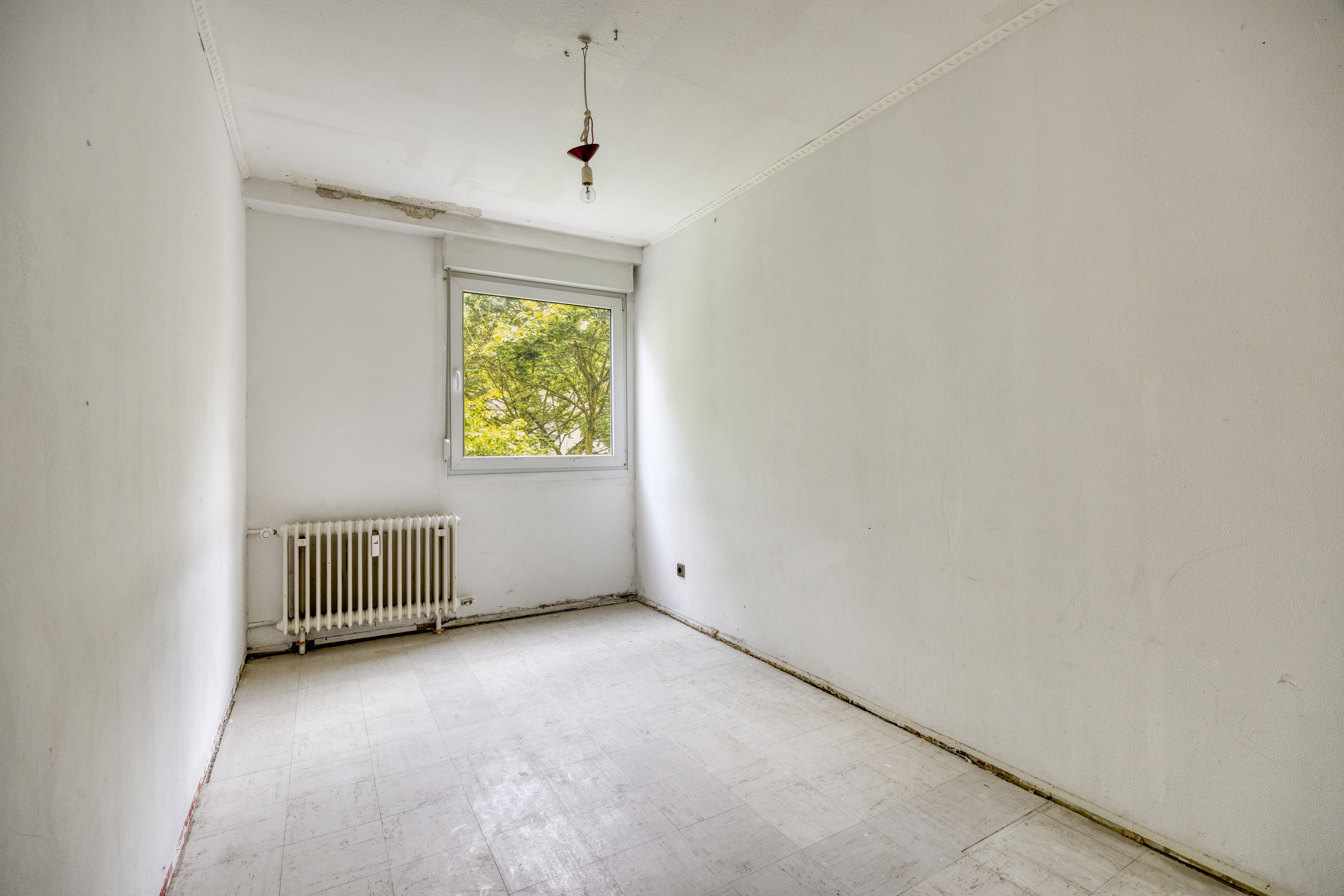 Eigentumswohnung Münster-Coerde – Helles Zimmer mit Gartenblick