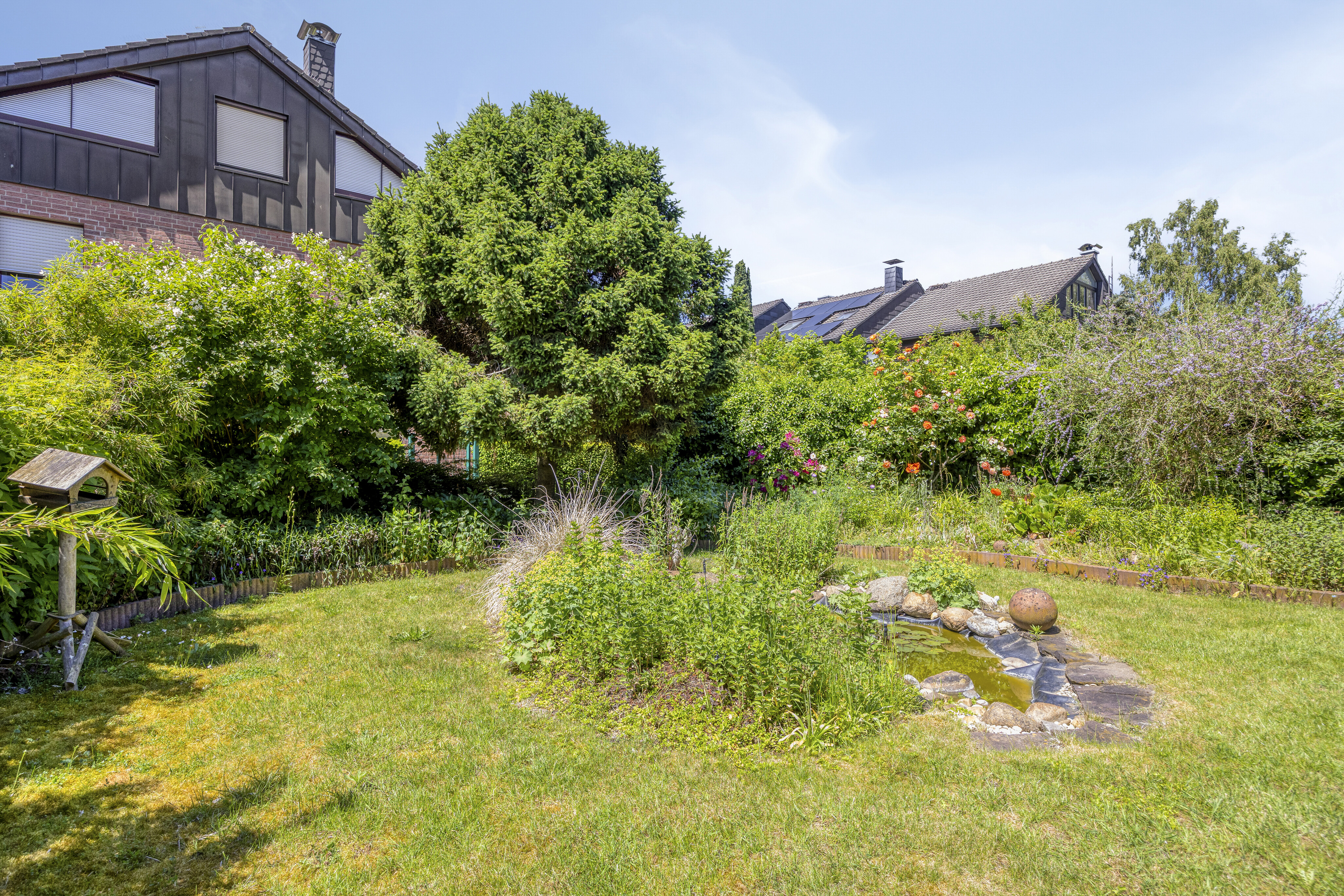 Reiheneckhaus Münster-Rumphorst – Hausansicht vom Garten mit privatem Eckgrundstück