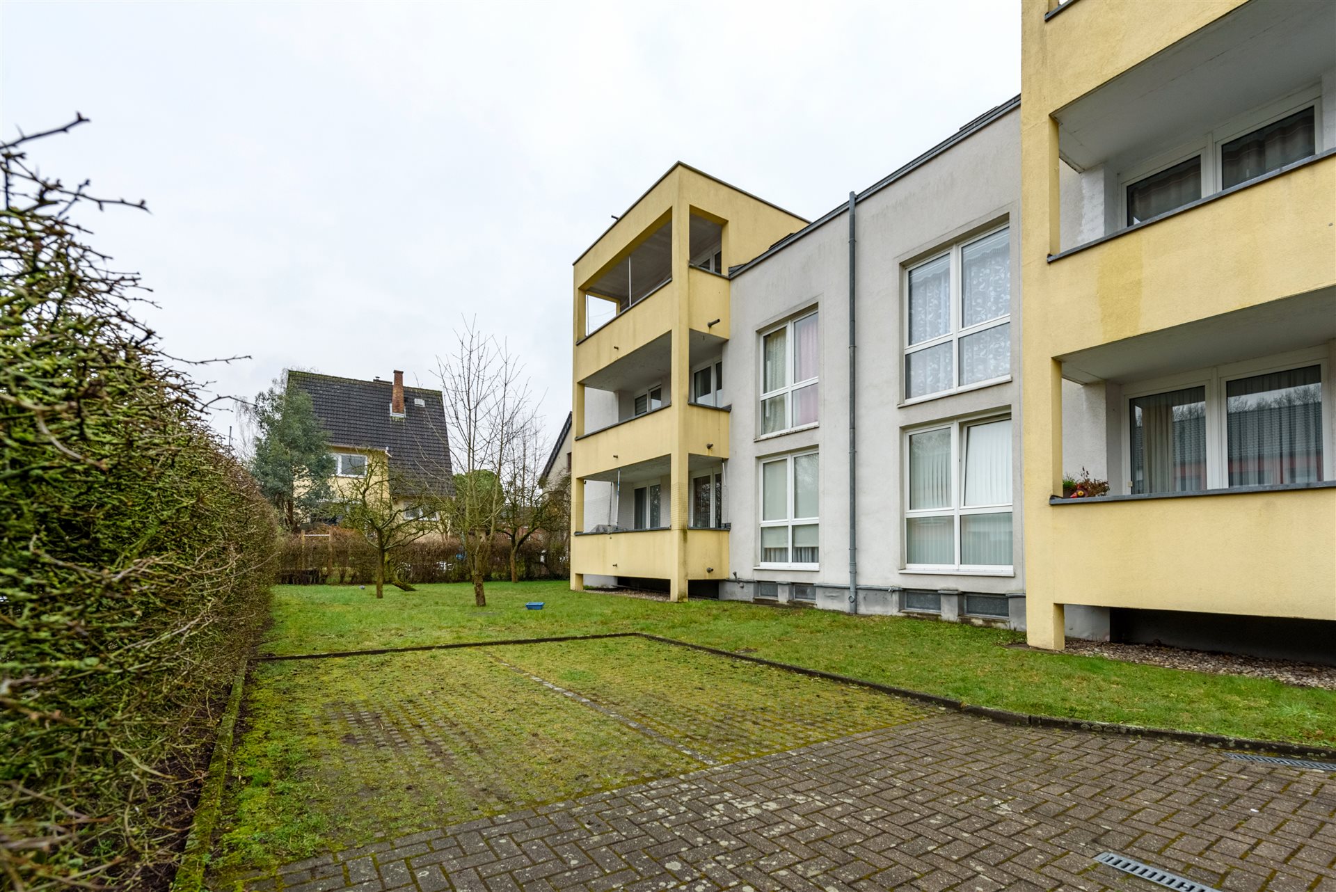 Eigentumswohnung Münster-Gremmendorf – Außenansicht Rückseite mit Garten